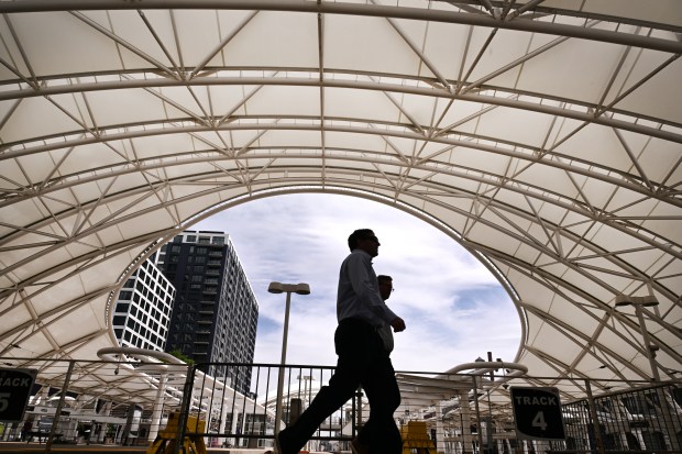 People walk near the tracks at Union Station in Denver on May 13, 2025. (Photo by Helen H. Richardson/The Denver Post)