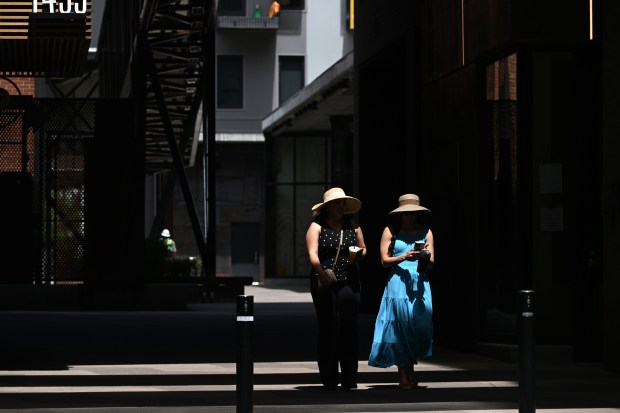 Two women walk towards 16th Street in Denver on May 13, 2025. (Photo by Helen H. Richardson/The Denver Post)